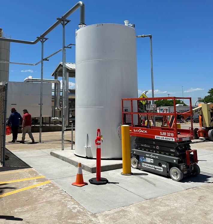 Diffusion tank set on a new concrete pad