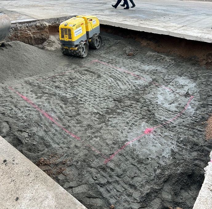 Compacted base prepared for a concrete tank pad