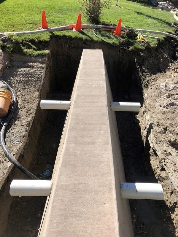 Concrete dam wall in forms at Polo Club North, Denver