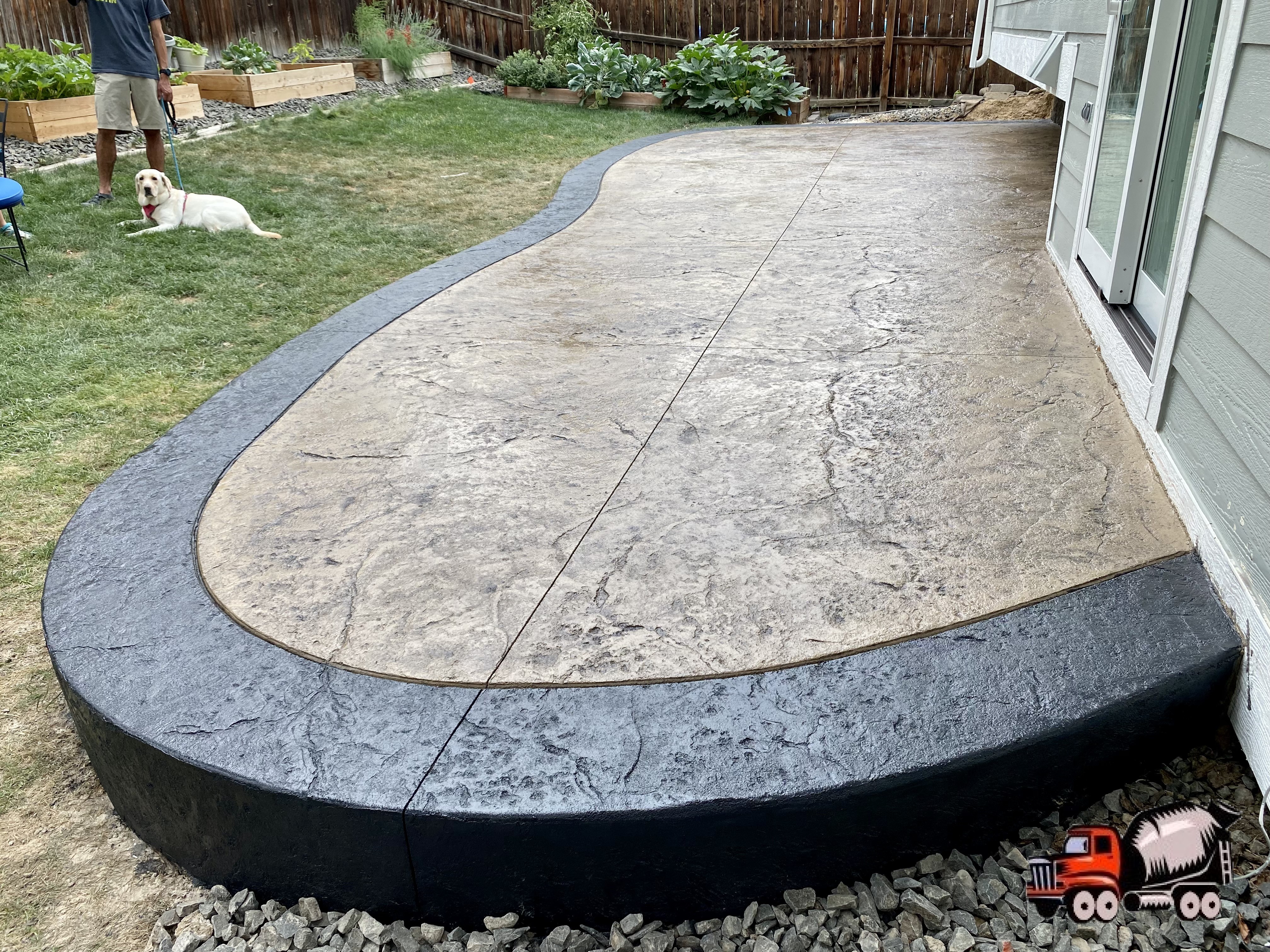 Stamped concrete patio w/ stained border